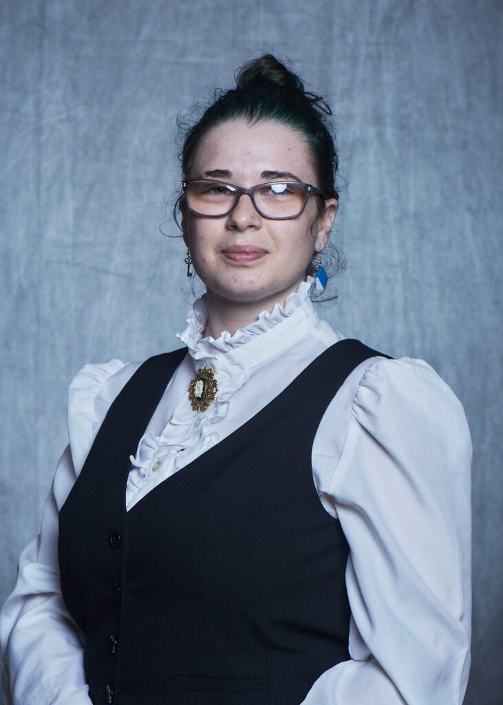 Headshot w glasses 2